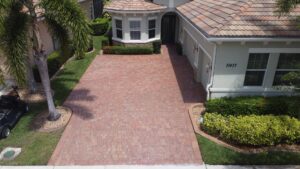 Brick driveway after professional paver sealing by Clean Master Exterior Services