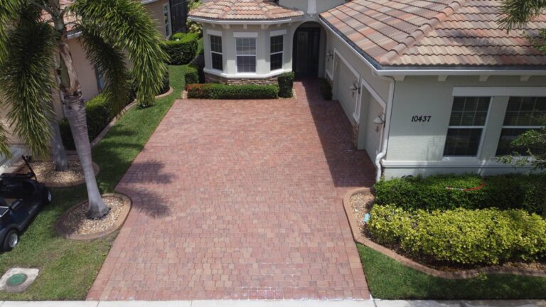 Brick driveway after professional paver sealing by Clean Master Exterior Services